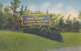 This gigantic keystone marker-shaped, two-paneled sign announced to highway travelers that they had reached Kane Summit, the highest peak in Pennsylvania.