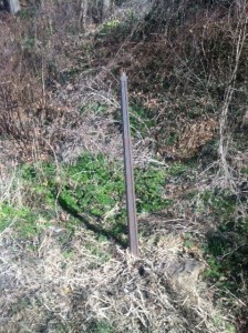 Dec. 2012 photo by JGl shows missing marker and broken off post top.