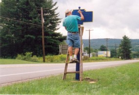 2010 photo of Jim Carn painting marker